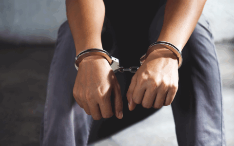 a man with a handcuff