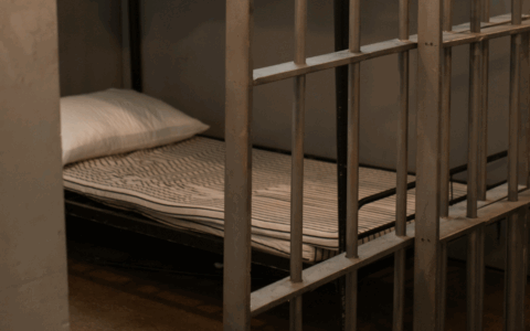 a bed in a cell