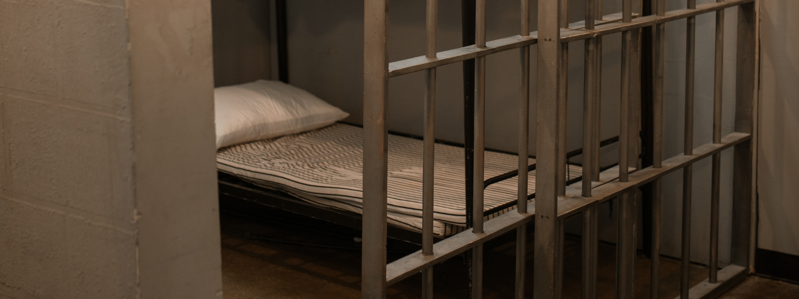 a bed in a cell