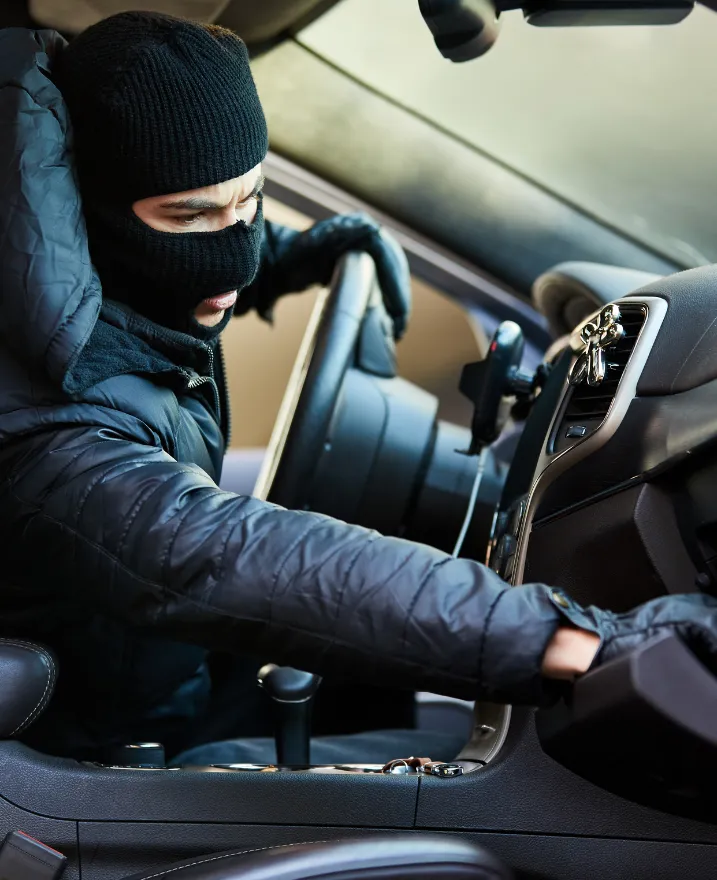 Person in handcuffs, theft and fraud defence